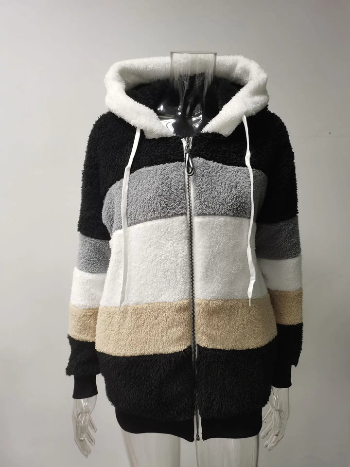 Woman wearing black colorblock fleece hooded jacket front view