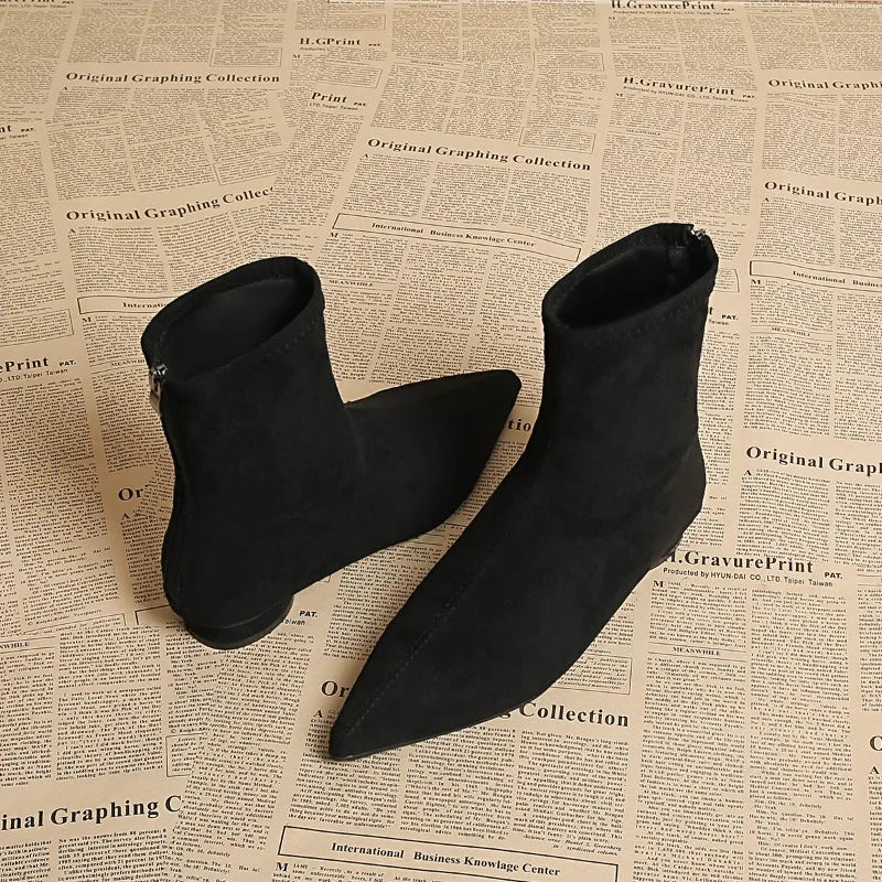 Black ankle boots side angle view