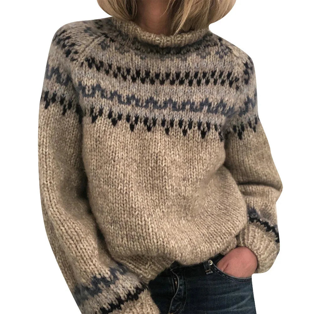Woman wearing gray fair isle turtleneck sweater with dark pattern yoke