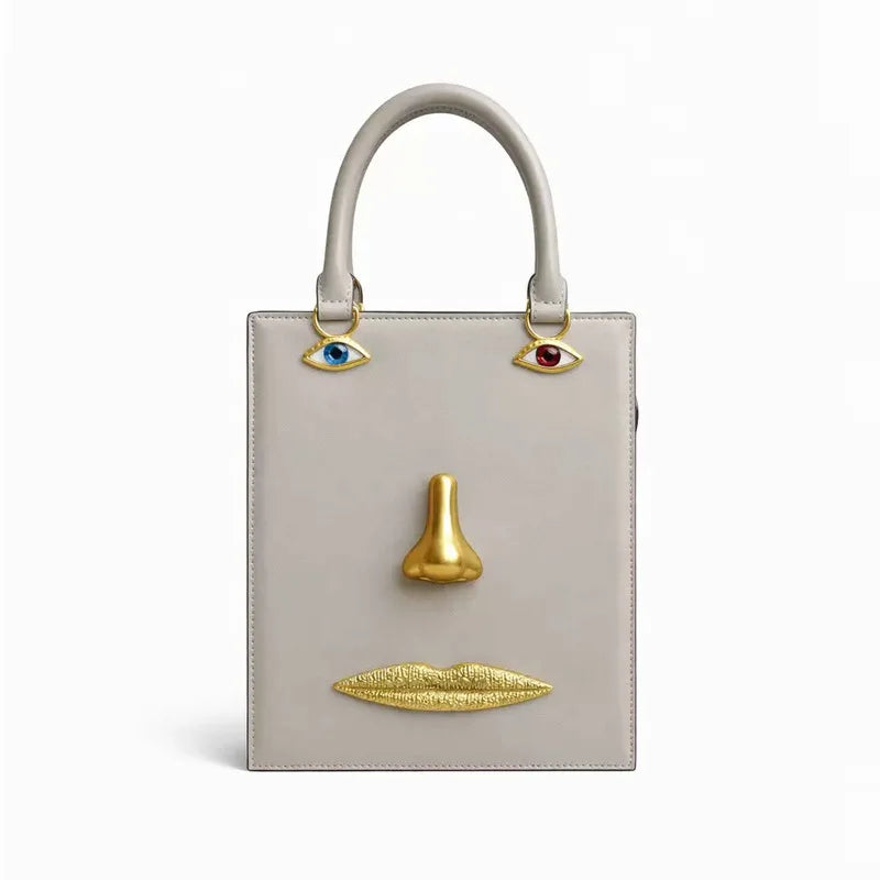 Genevieve Statement Face Top Handle Bag