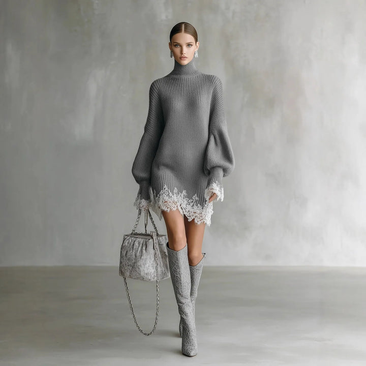 Woman wearing grey ribbed turtleneck sweater dress with lace hem and knee boots