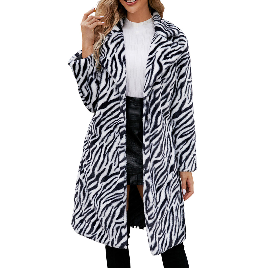 Woman wearing zebra print faux fur long coat with collar detail