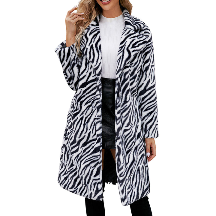 Woman wearing zebra print faux fur long coat with collar detail