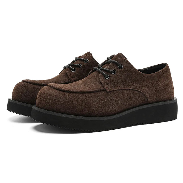 Side angle of brown suede Derby shoes with platform sole