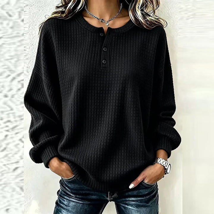Black waffle knit henley top with button placket