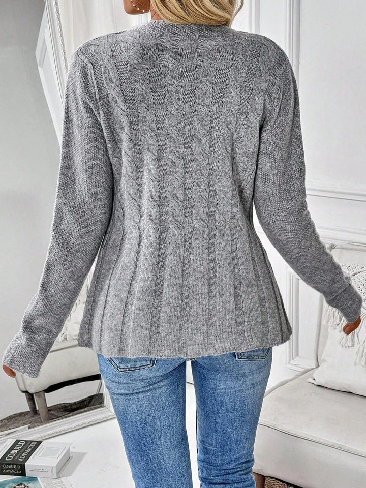Back view of gray cable knit peplum cardigan