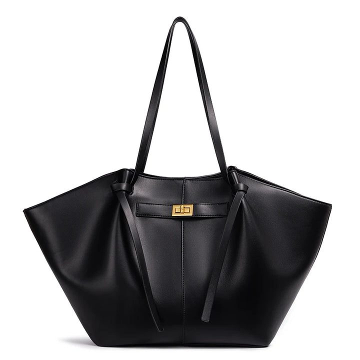 Black leather winged tote bag with gold turn-lock front