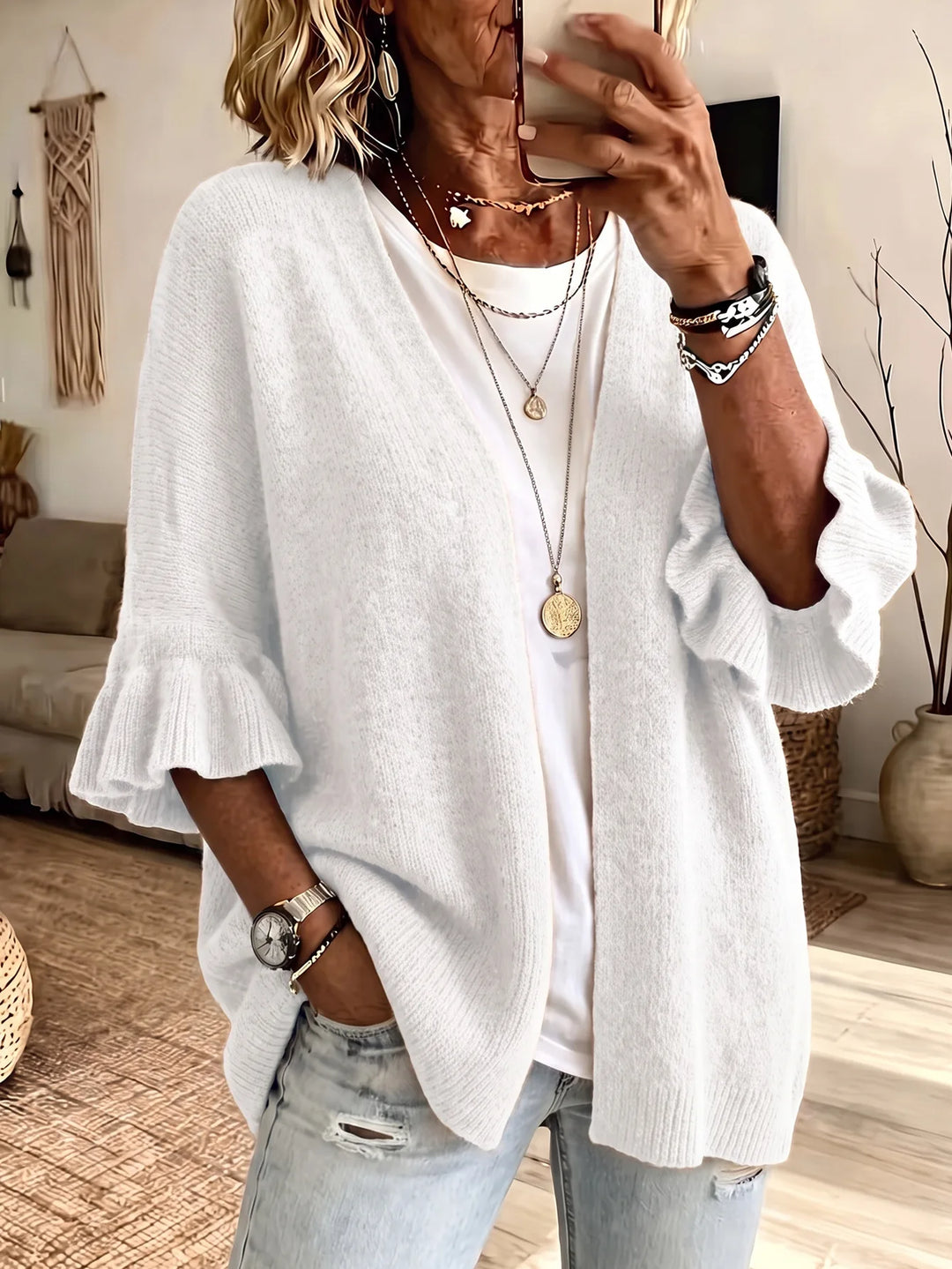 White knit cardigan with ruffle flare sleeves, front view