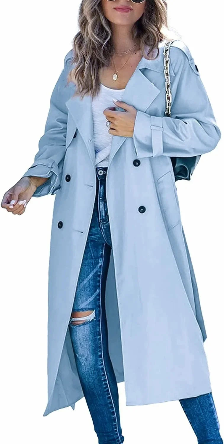 Woman wearing sky blue oversized double breasted trench coat
