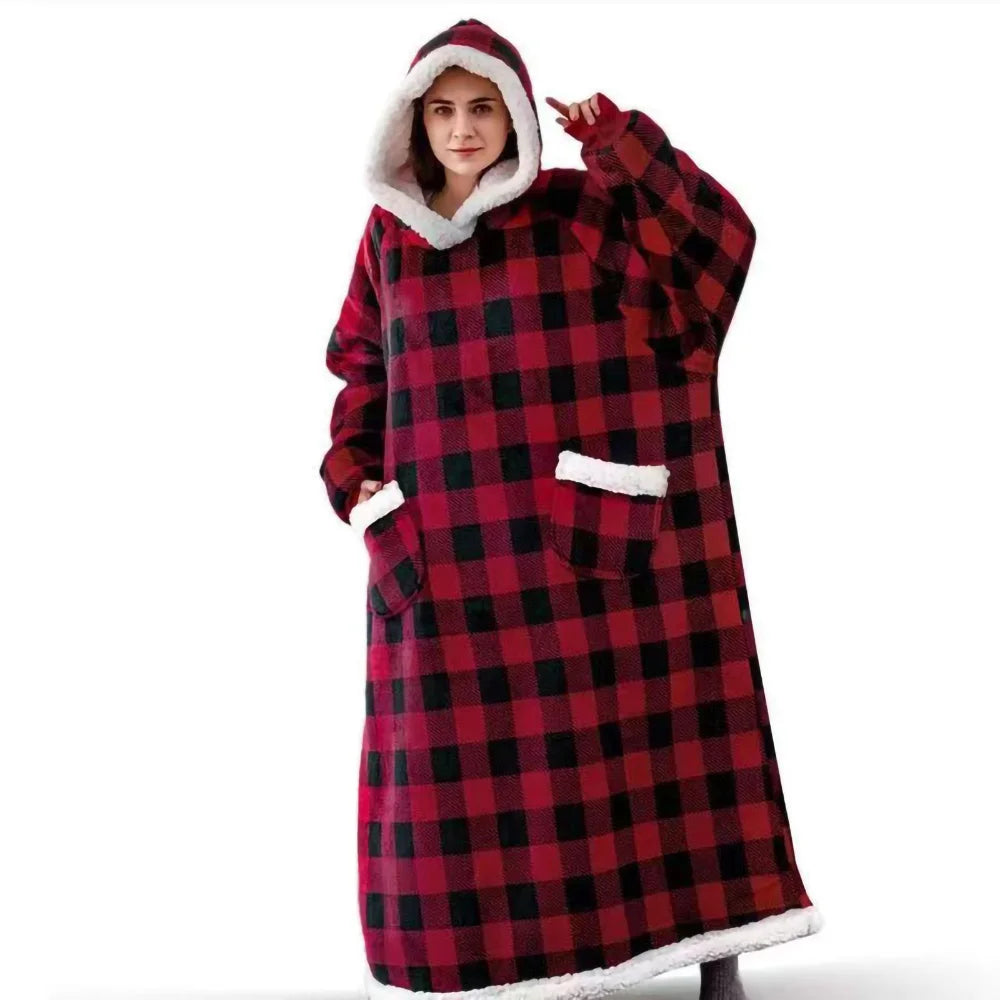 Woman wearing red and black plaid hooded wearable blanket