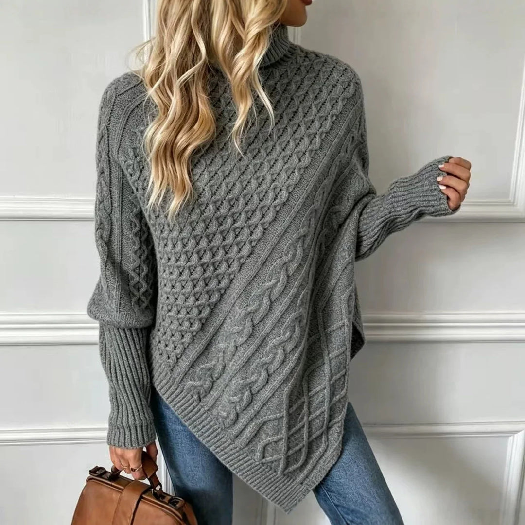 Gray cable knit poncho sweater, back view