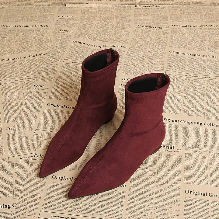 Wine red ankle boots angled front view