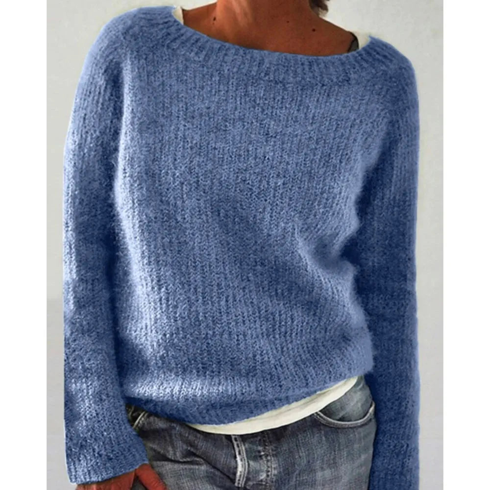 Woman wearing light blue ribbed knit sweater
