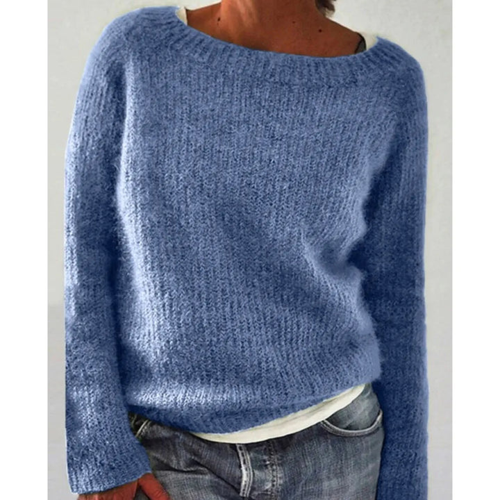Woman wearing light blue ribbed knit sweater