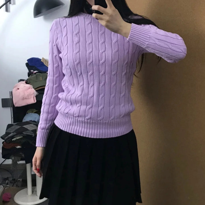 Light purple cable knit crew neck sweater on model