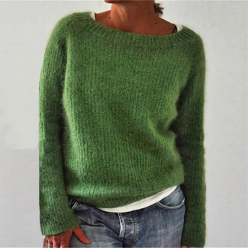Woman wearing green ribbed knit sweater, front view