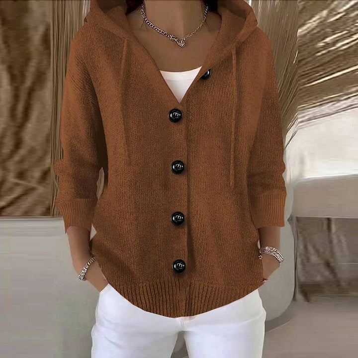 Woman wearing rust brown hooded button-front cardigan sweater