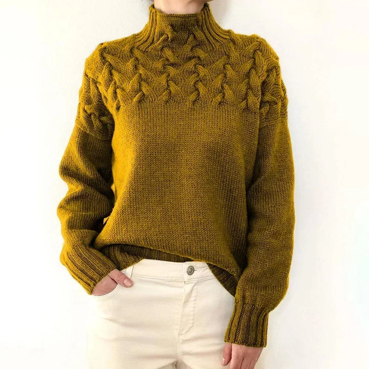 Yellow cable knit turtleneck sweater, front view