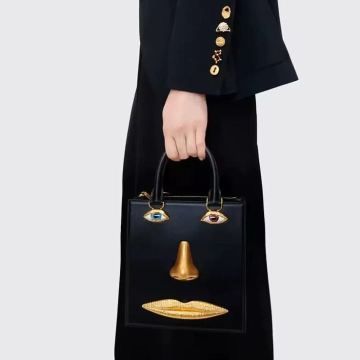 Genevieve Statement Face Top Handle Bag
