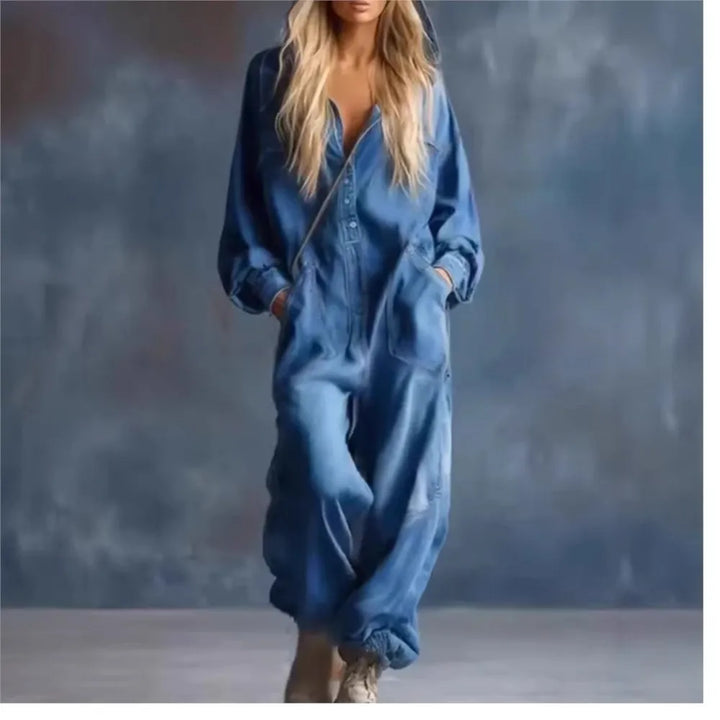 Light blue hooded denim jumpsuit worn with boots, front view