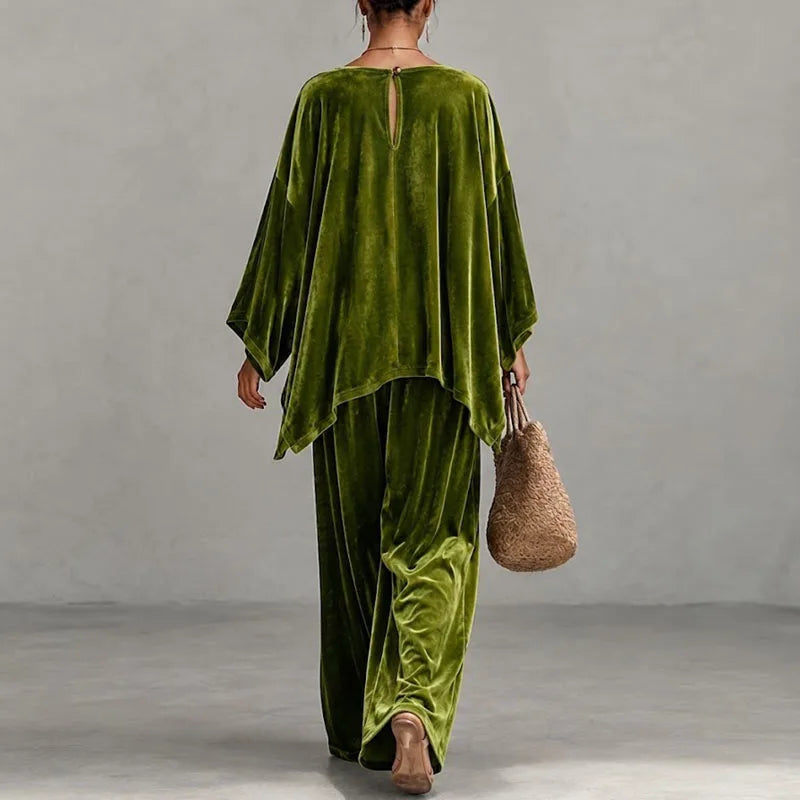 Green velvet two piece set shown from the back with keyhole closure