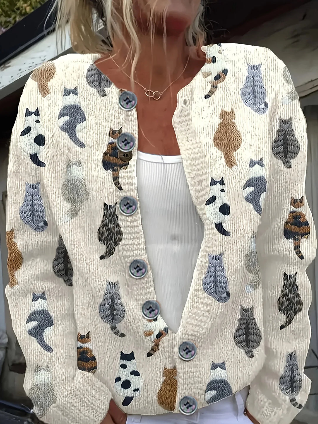 Cream cardigan with cat print pattern, front view