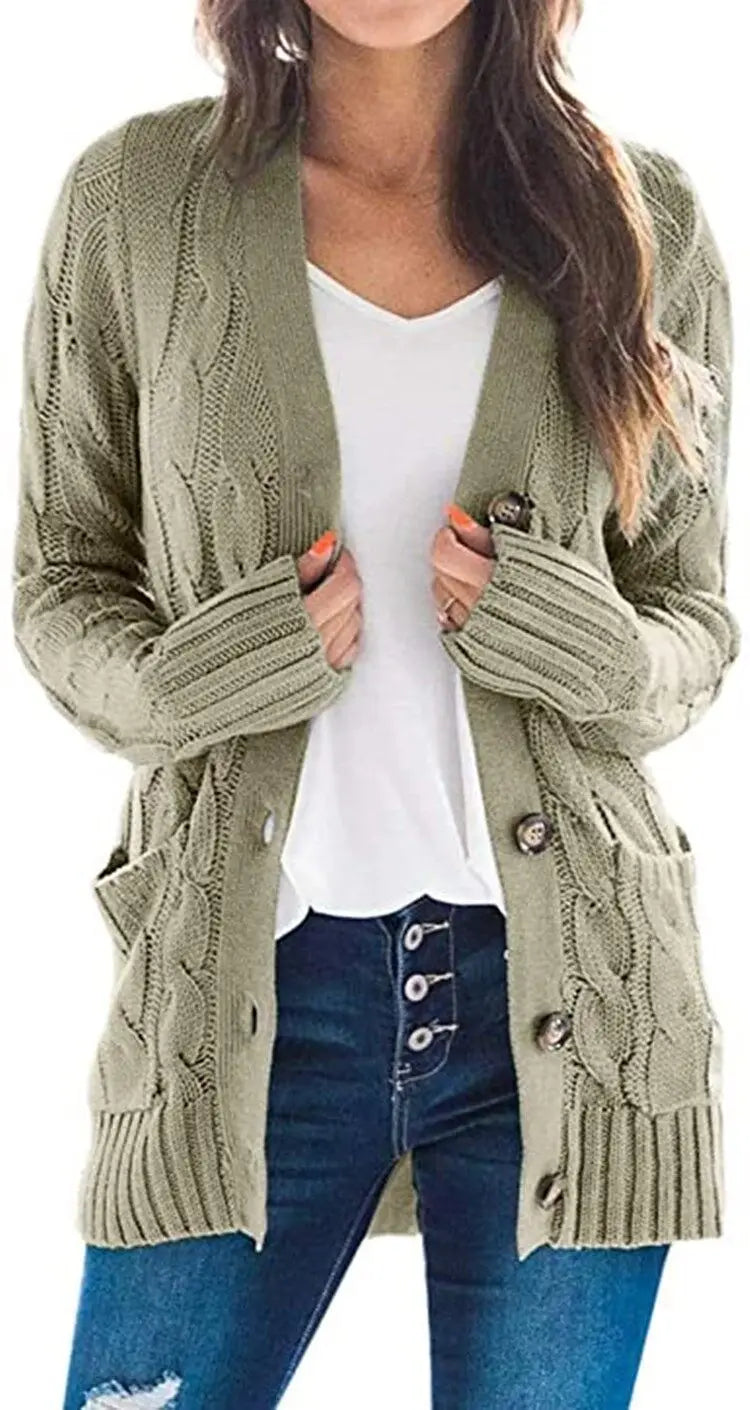 Woman wearing light army green cable knit cardigan