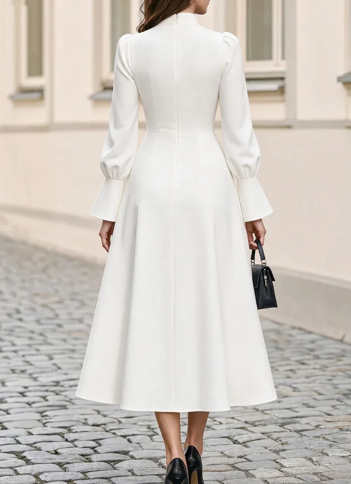 White midi dress, back view showing zip closure
