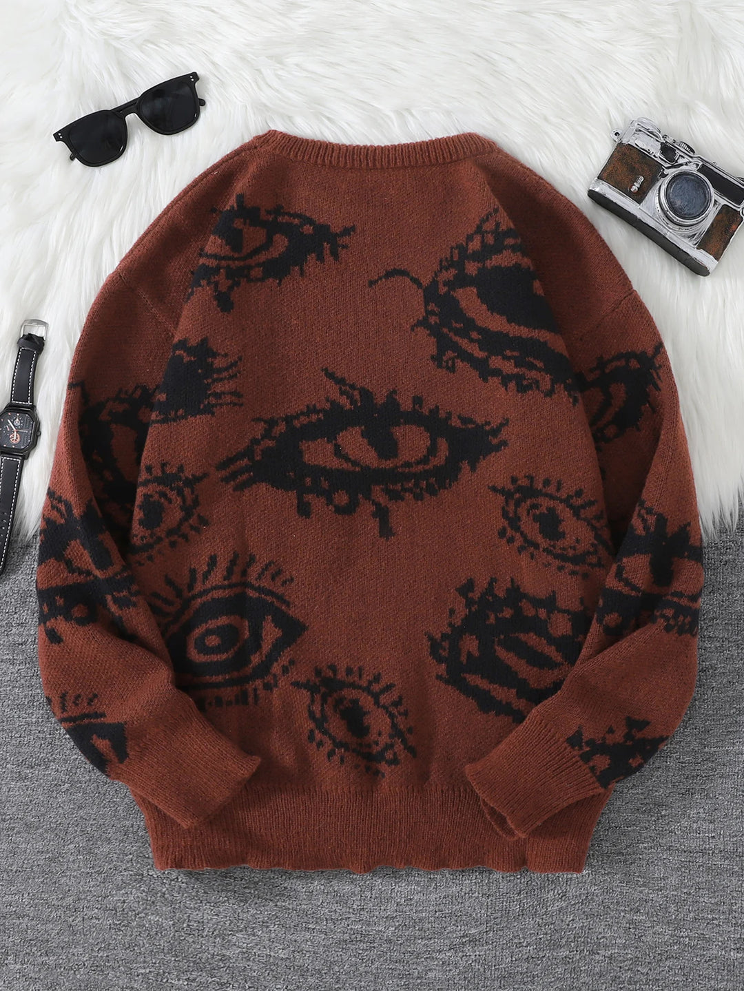 Rust brown eye print sweater back view flat lay