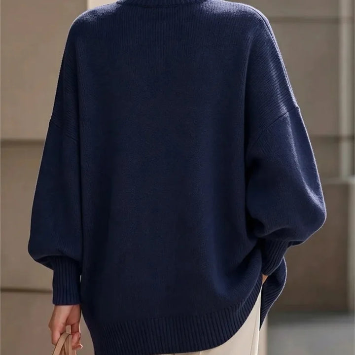 Back view of navy blue ribbed knit sweater