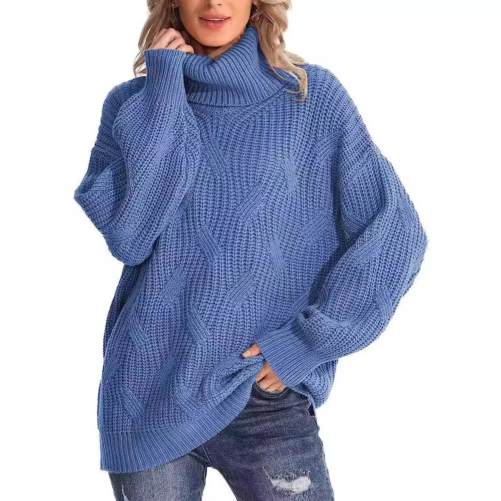 Woman wearing blue cable knit oversized turtleneck sweater