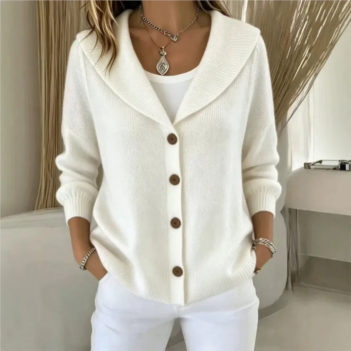 Woman wearing white shawl collar button front cardigan