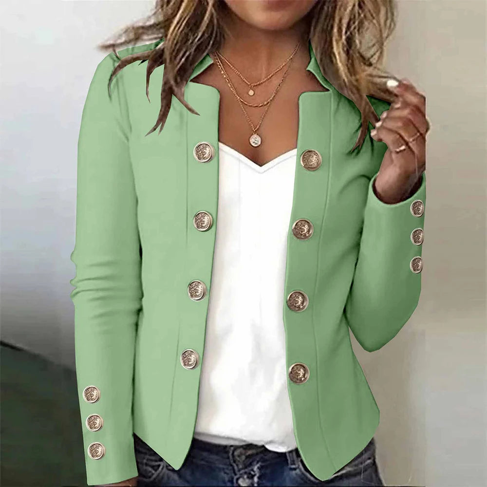 Sage green blazer with gold button detail worn open
