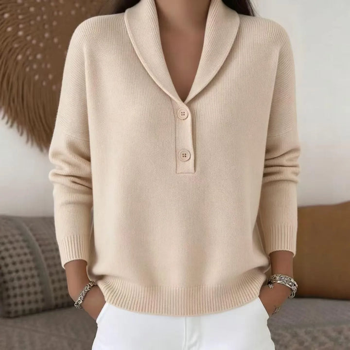 Woman wearing apricot shawl collar button sweater