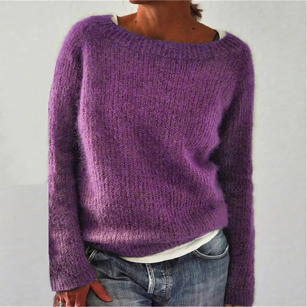 Woman wearing purple ribbed knit sweater, front view