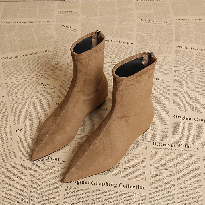 Khaki suede pointed toe ankle boots pair