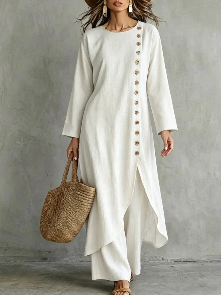 Close up of woman wearing cream two piece set with button placket top