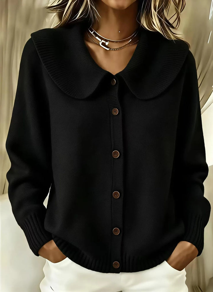 Woman wearing black wide collar button front cardigan