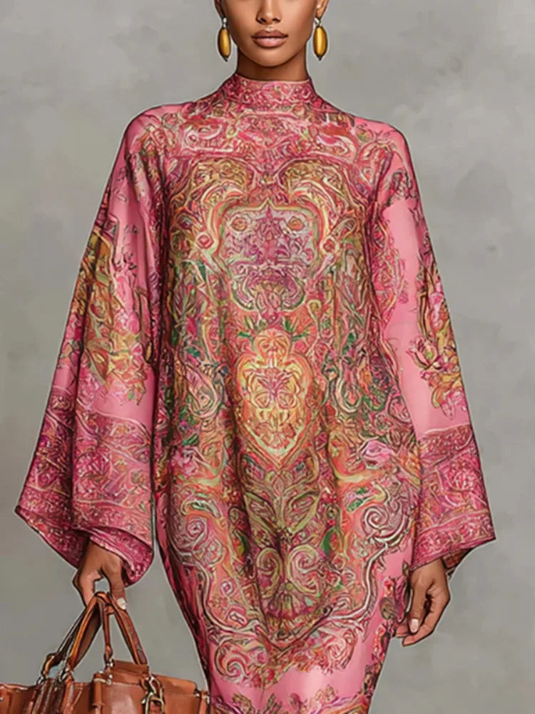 Close-up of pink paisley print kaftan dress bodice and stand collar