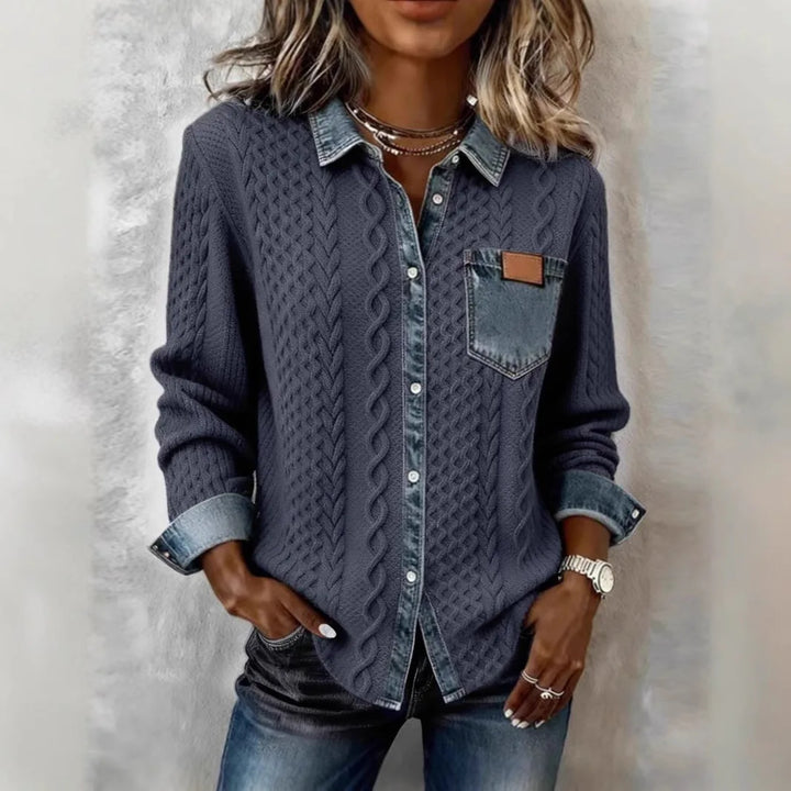 Woman wearing navy blue cable knit cardigan shirt jacket with denim-look collar and pocket