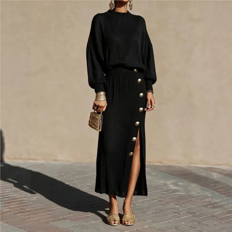 Woman in black ribbed sweater dress with button side slit