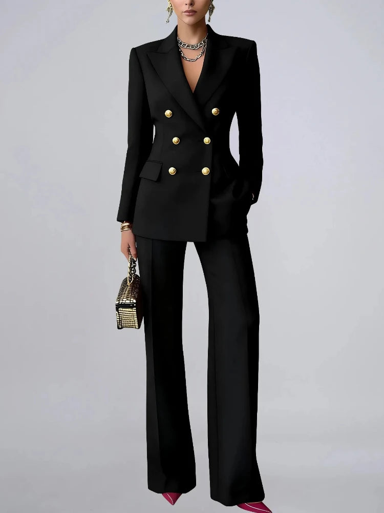 Woman wearing black double-breasted blazer and wide leg pants suit