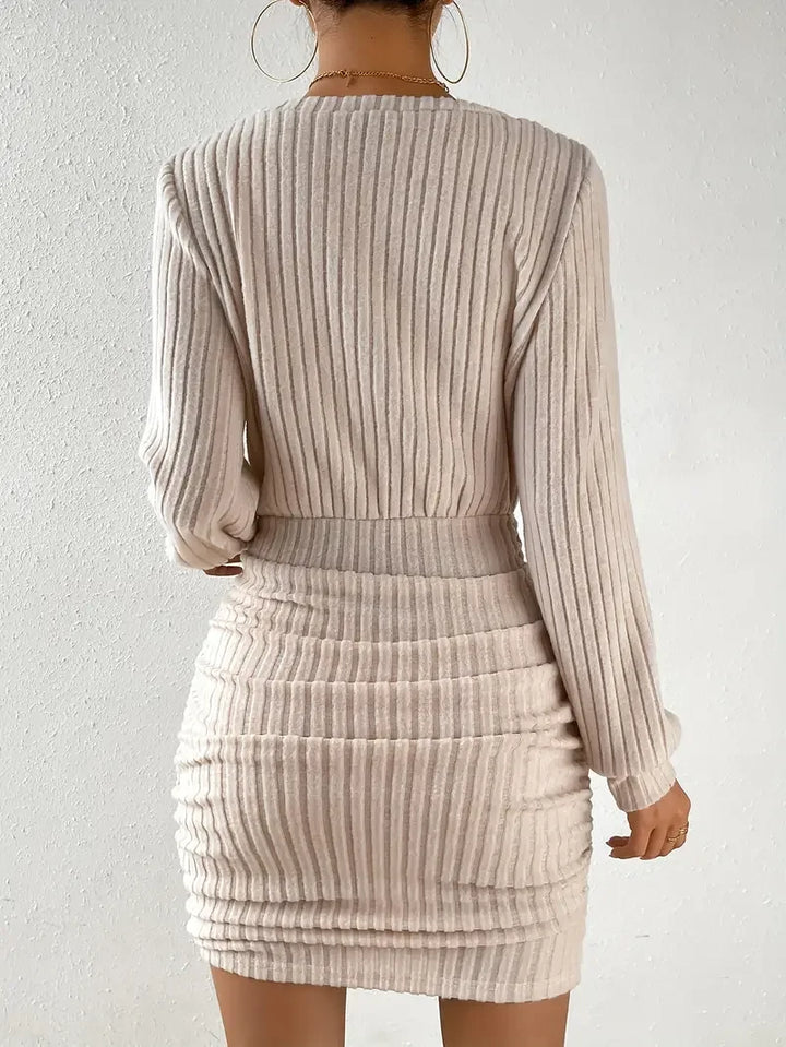 Beige ribbed knit mini dress, back view