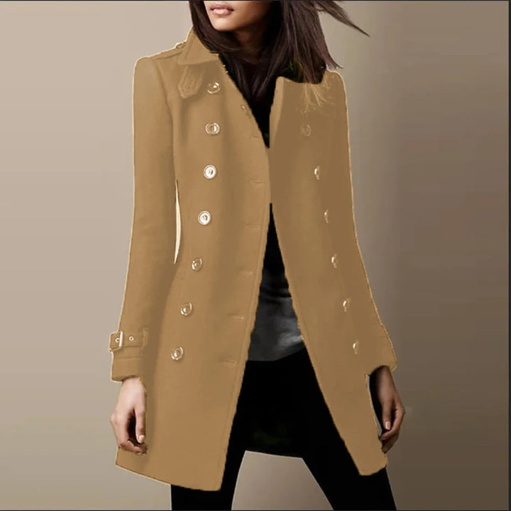 Woman wearing a khaki double-breasted mid-length coat, front view