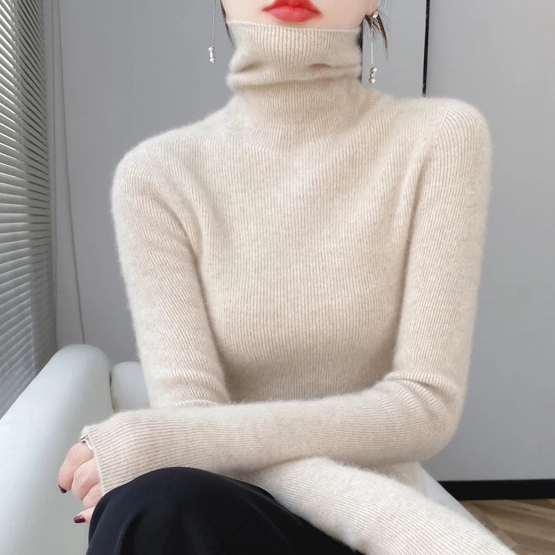 Woman wearing beige ribbed turtleneck sweater