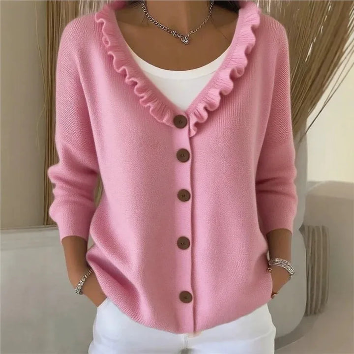 Pink ruffle V-neck button front cardigan on model