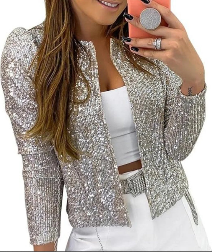 Woman wearing silver sequin cropped jacket