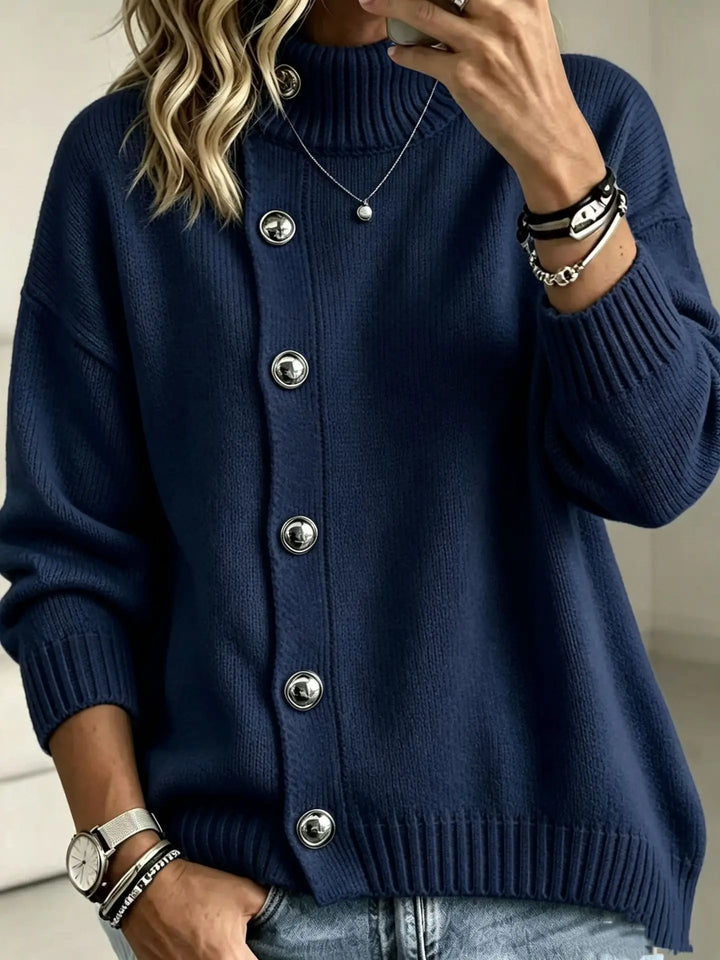 Woman wearing navy blue button front mock turtleneck sweater