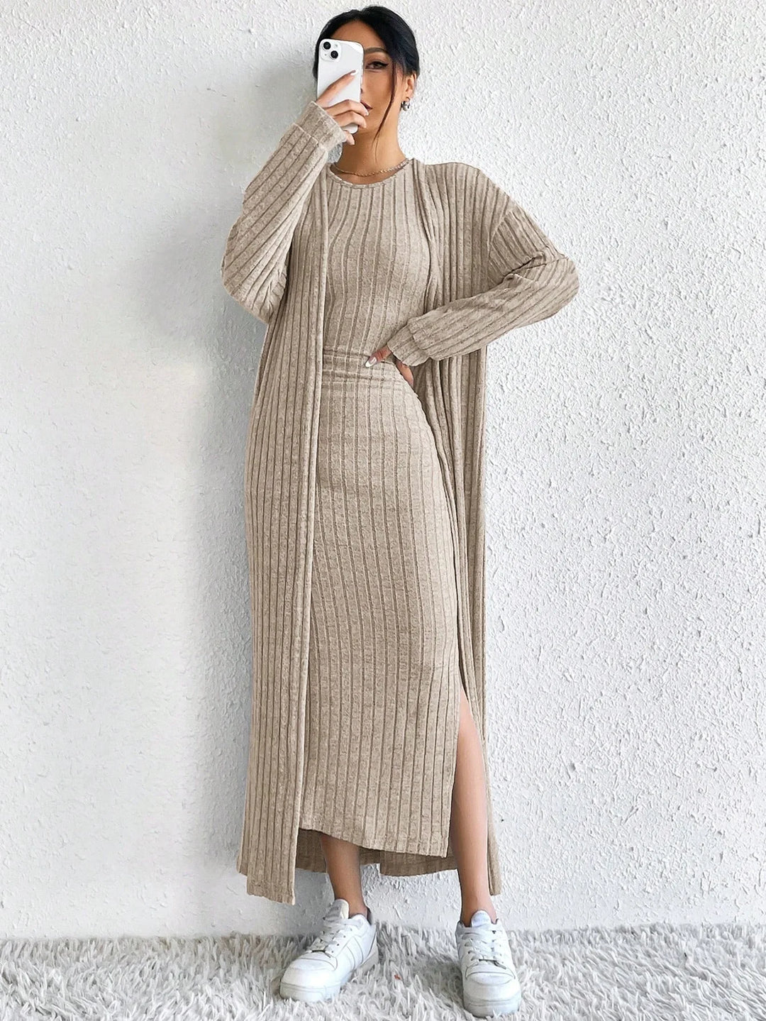 Woman taking mirror selfie in khaki ribbed dress and cardigan set