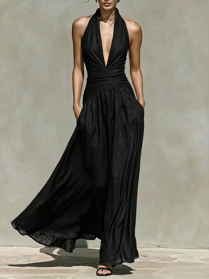 Black halter maxi dress with cinched waist, front view